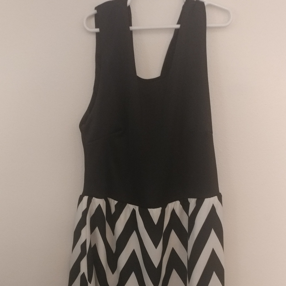 Midi black dress with chevron skirt